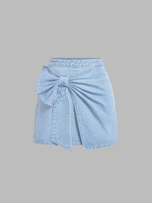 light wash denim mini skirt with bow detail