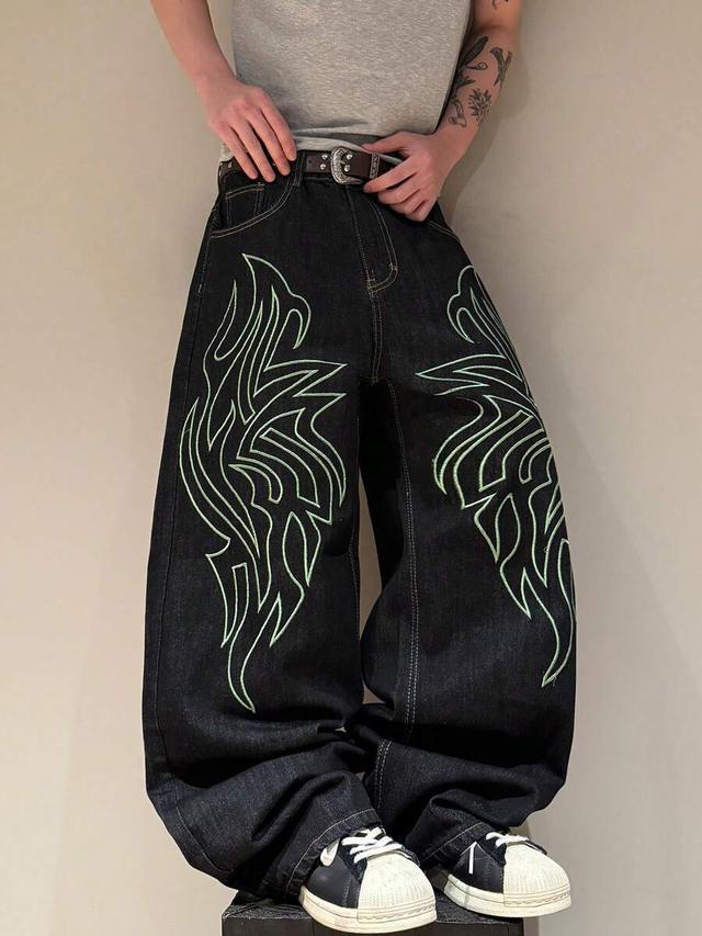 black denim loose straight leg pants with green embroidery