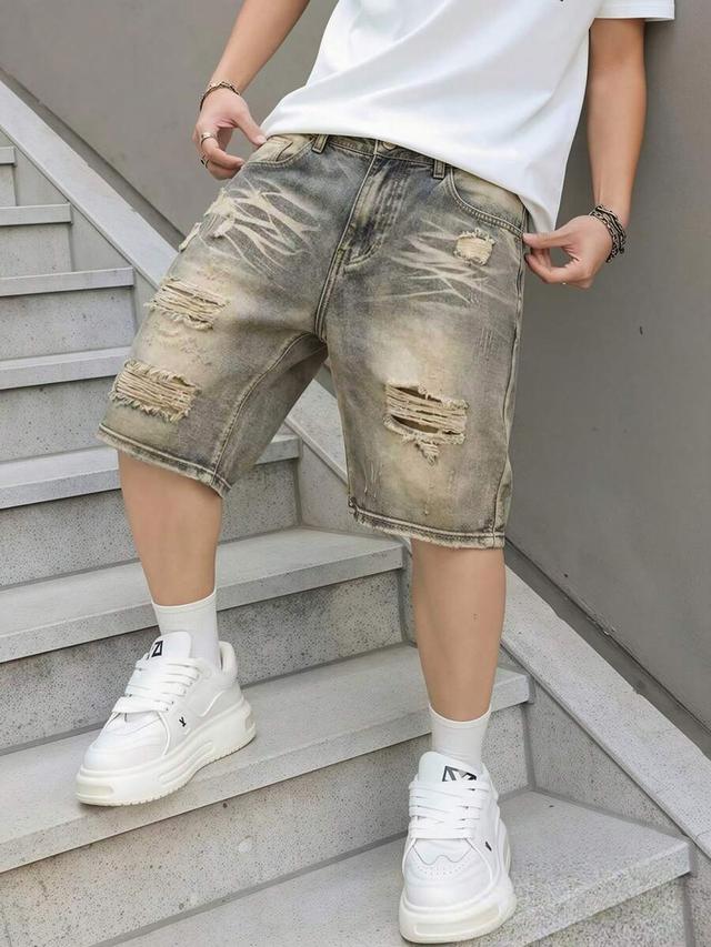 shiny steel blue distressed denim shorts