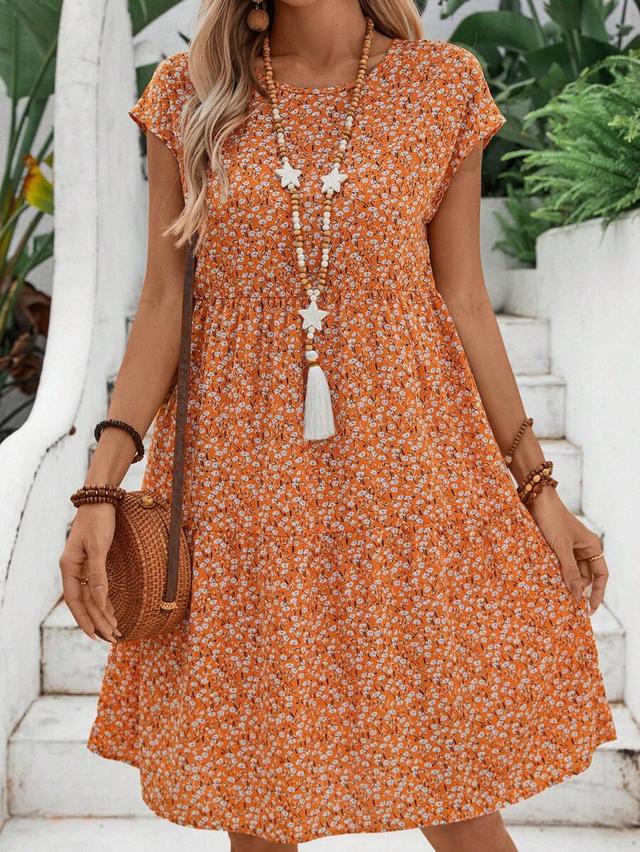 orange ditsy floral short sleeve tiered dress