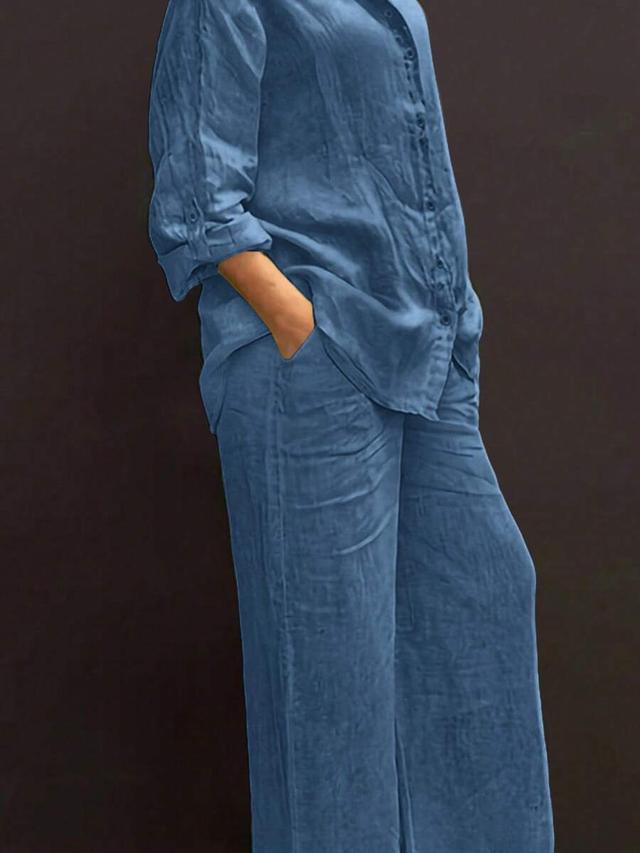 blue linen button-up shirt and matching wide-leg trousers