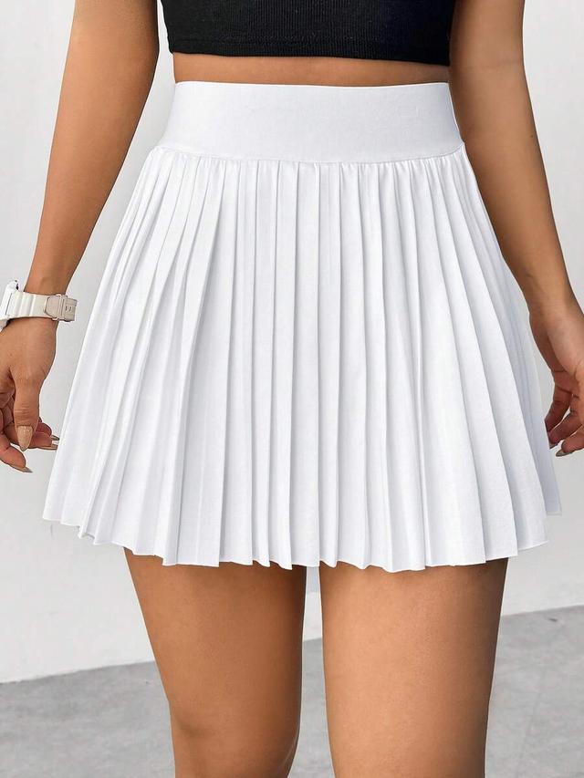 solid white pleated mini skirt