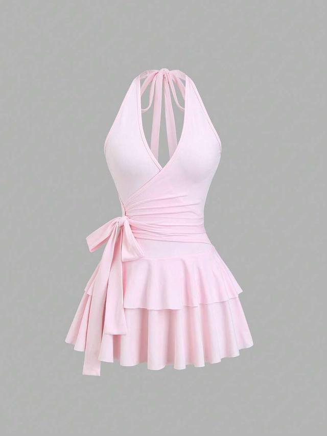 light pink halter tie back ruffled mini dress