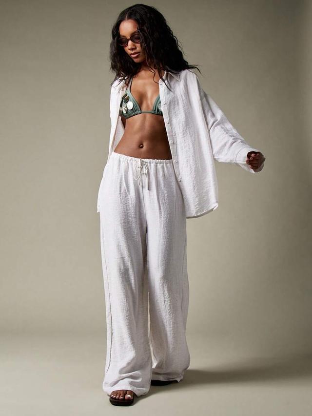 white linen oversized button down shirt and palazzo pants