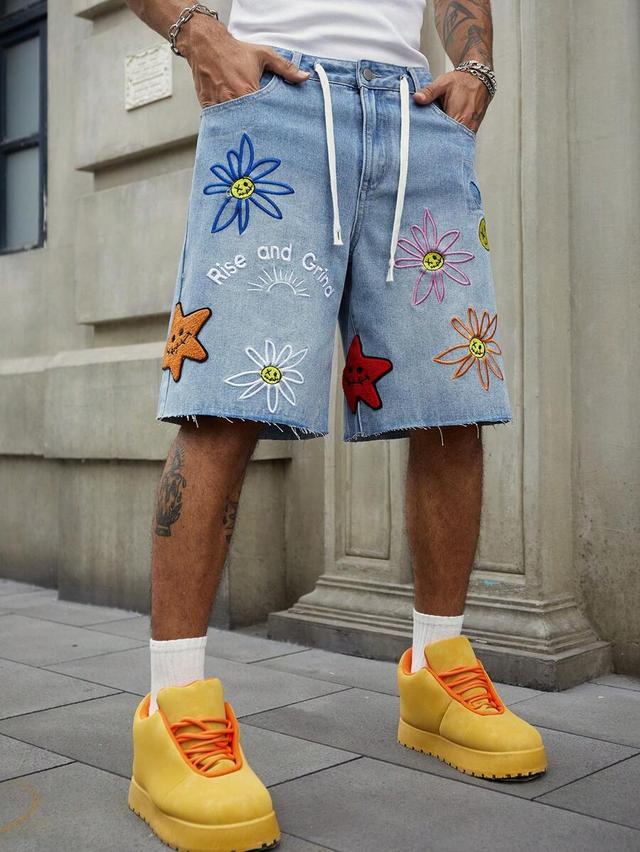 light wash denim shorts with floral embroidery