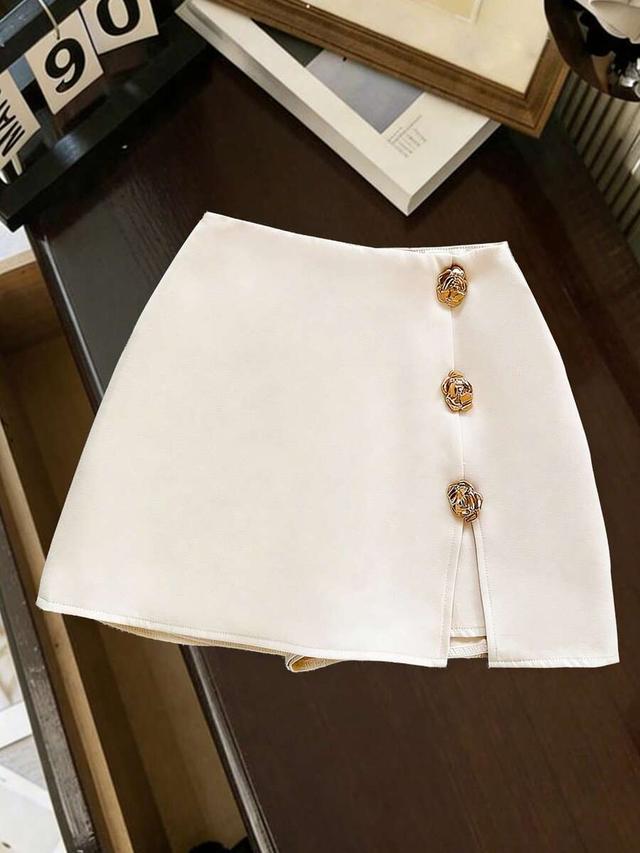 off-white high waist skort with metal flower buttons