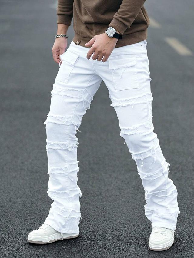 white denim slim fit distressed hoof cut pants