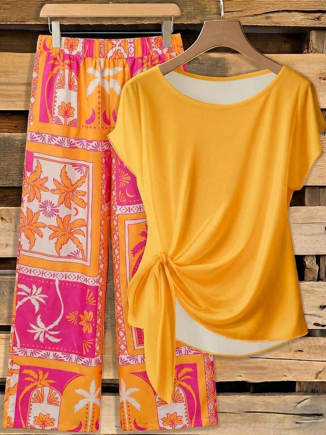 yellow knotted shirt and palm tree print pants set
