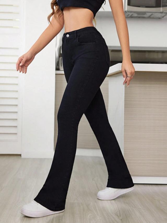 high-waisted black denim bell-bottom jeans