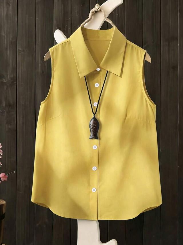 yellow sleeveless collared button-up casual blouse