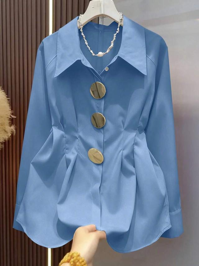 light blue metal button raglan long sleeve shirt