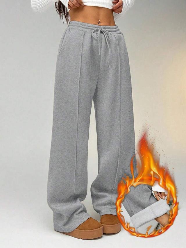 grey straight leg sweatpants with seam detail