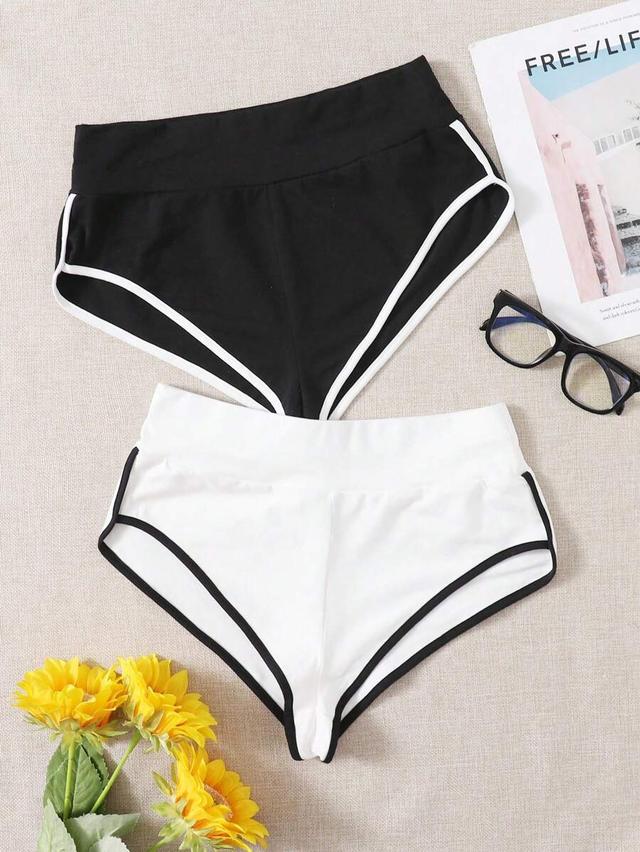 black and white color block track shorts
