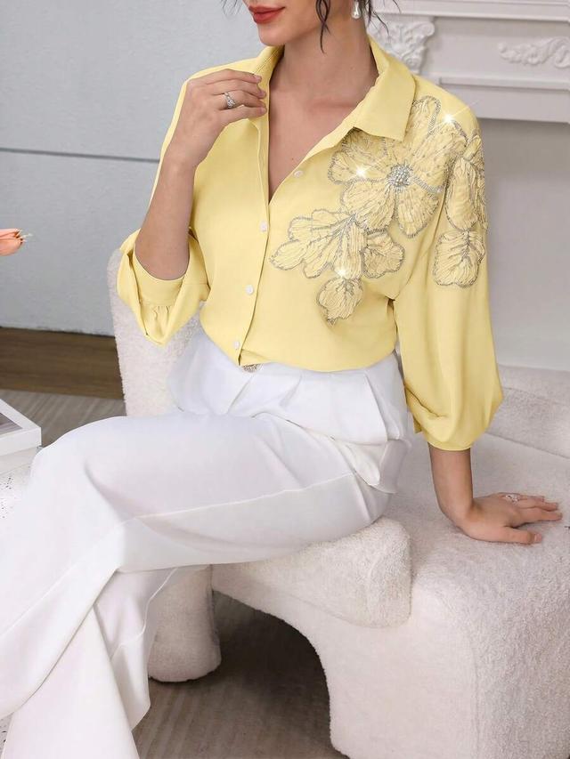 modelyn elegant blue beaded floral dropped shoulder blouse