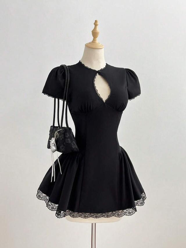 black mini dress with lace trim and keyhole
