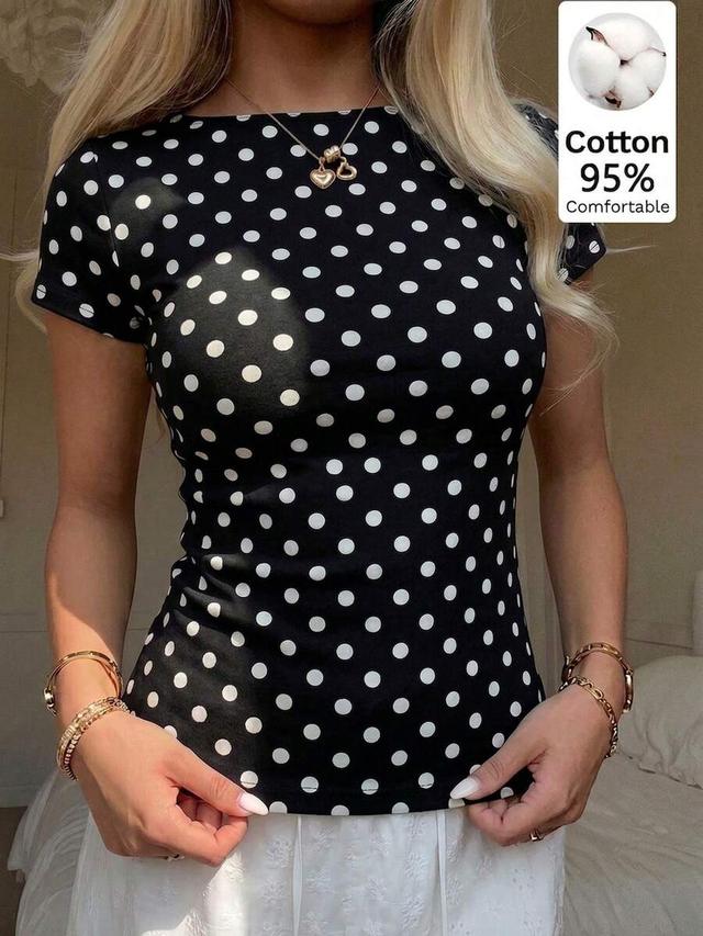minimalist black and white polka dot short sleeve top