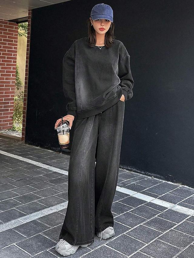 washed black denim sweatshirt and matching wide-leg trousers