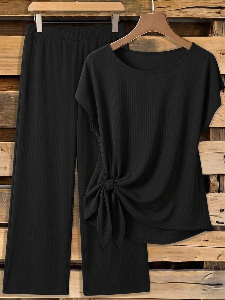 black ribbed knit short sleeve tie-front top