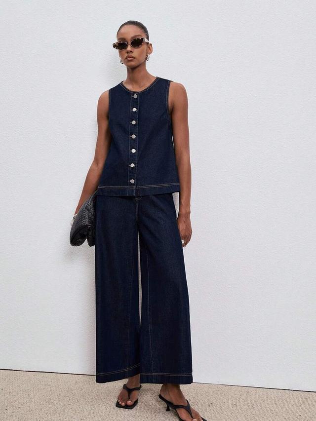 dark wash denim sleeveless vest and wide leg jeans