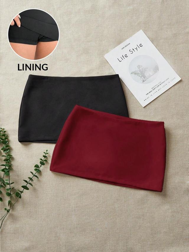 black two minimalist woven skorts in black and burgundy