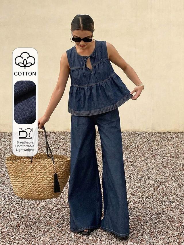 dark blue denim sleeveless tie-front ruffle top and trousers