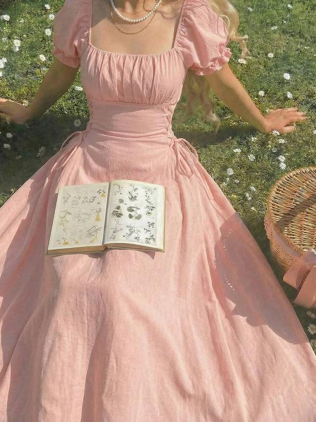 soft pink shirred midi dress with lace-up waist