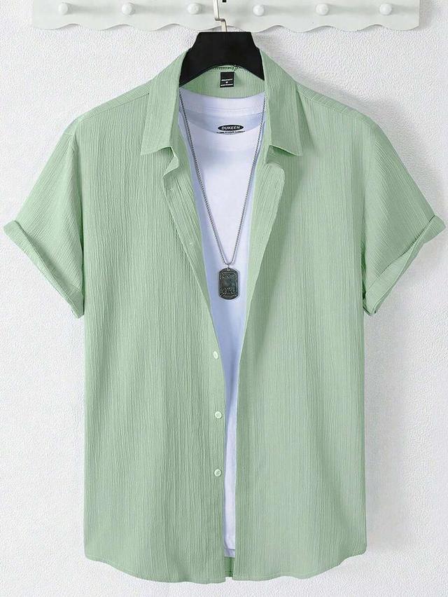 minimalist green textured short sleeve button-up shirt