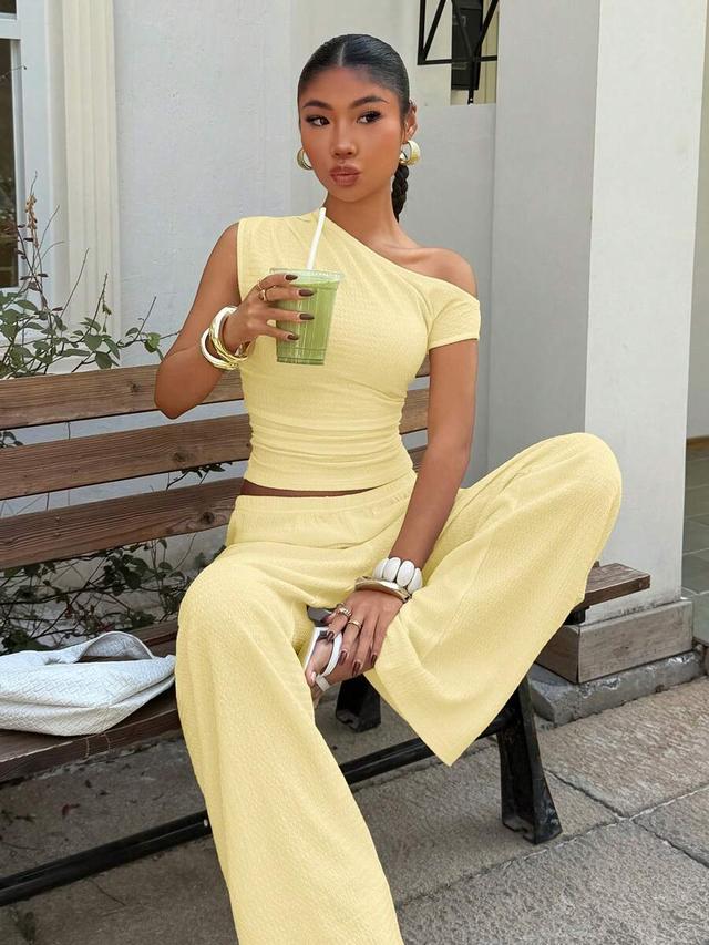 mustard yellow textured asymmetric shoulder top and pants set