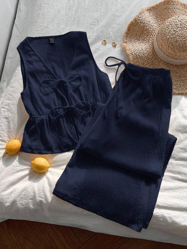 navy blue textured knit tie-front sleeveless top
