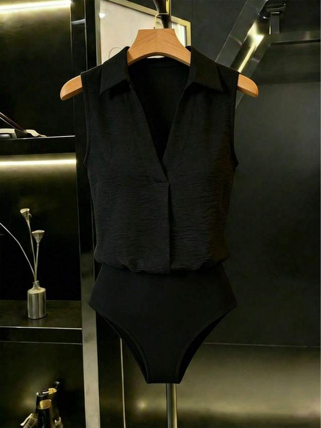 black sleeveless wrinkled fabric bodysuit with shirt collar