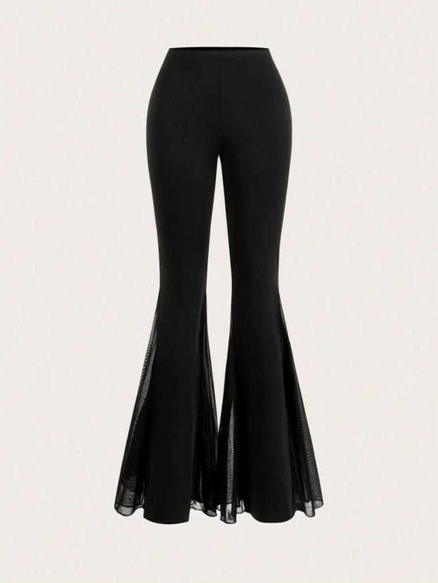 black flared trousers with mesh side inserts