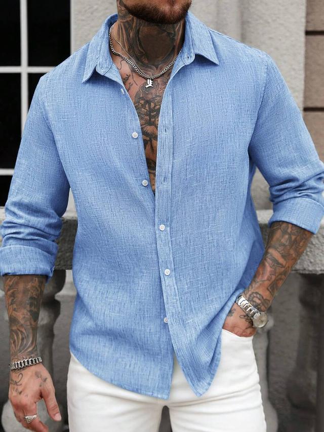 light blue textured long sleeve button-down shirt