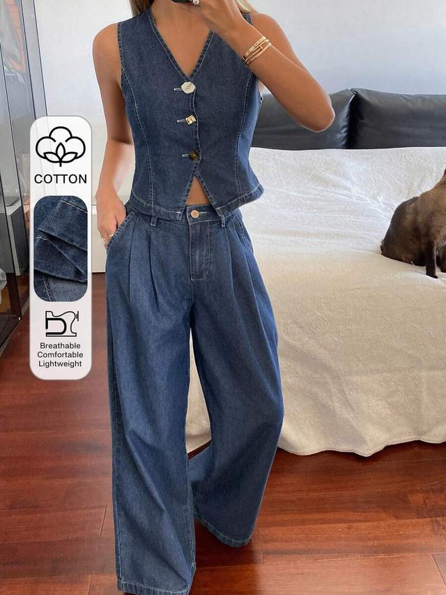dark wash denim vest and matching pleated wide-leg trousers