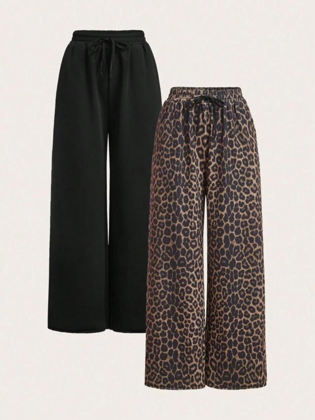 black leopard print and solid black wide leg sweatpants