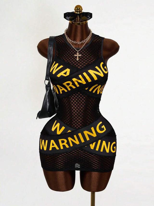 black mesh mini dress with yellow warning slogan graphics