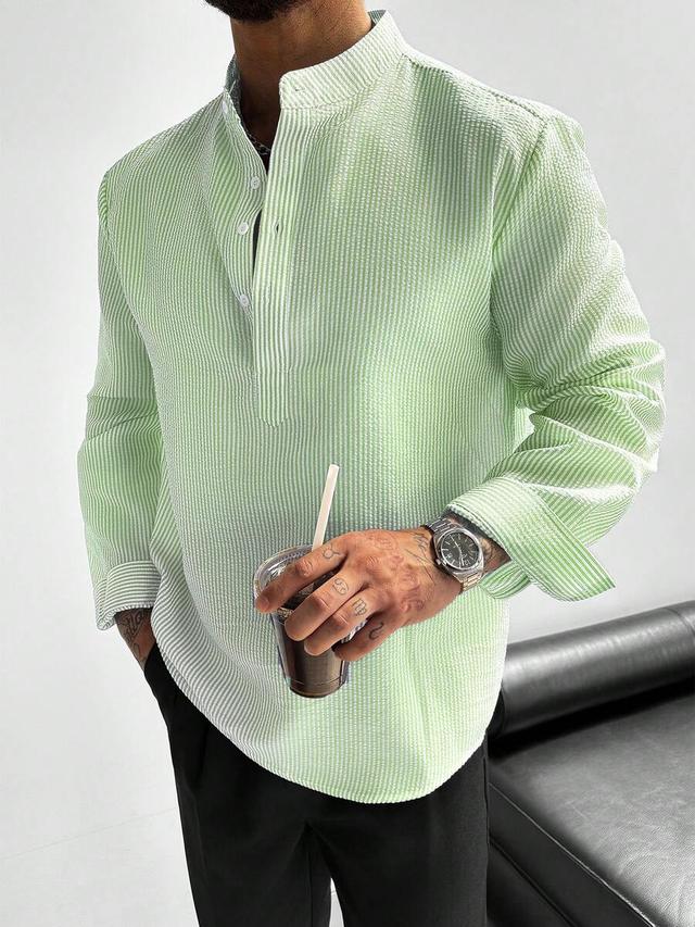 light green striped seersucker half-button stand collar shirt