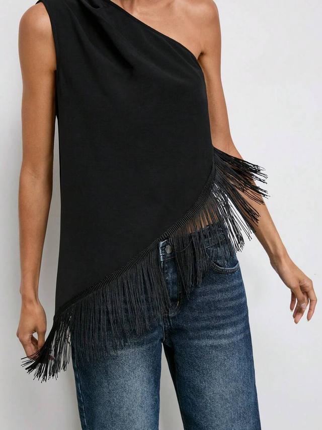 black one-shoulder sleeveless top with fringe hem