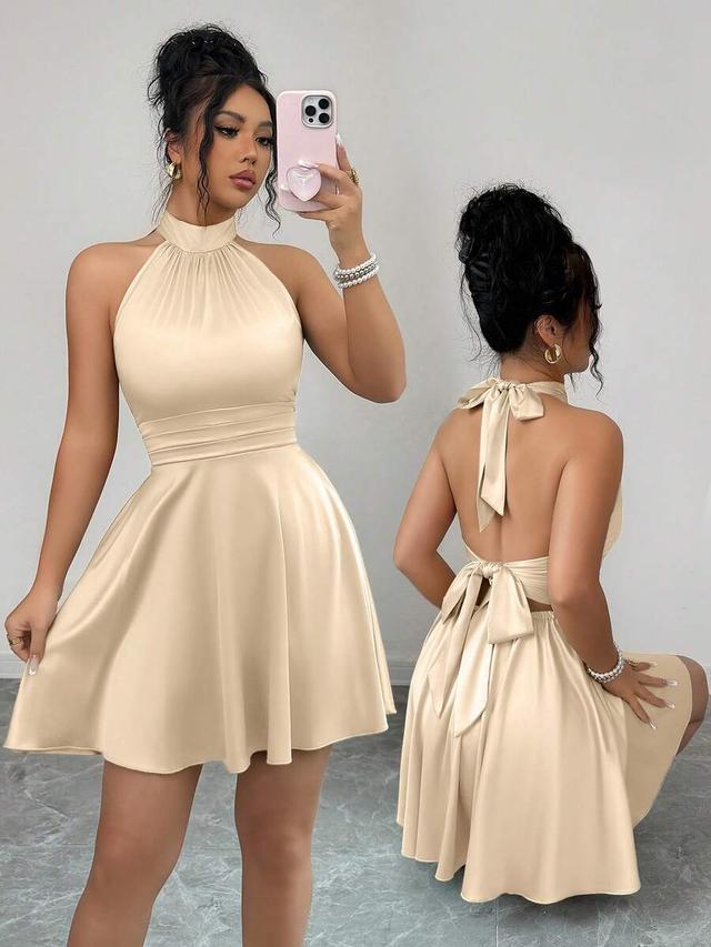 apricot satin tie-back open back mini dress