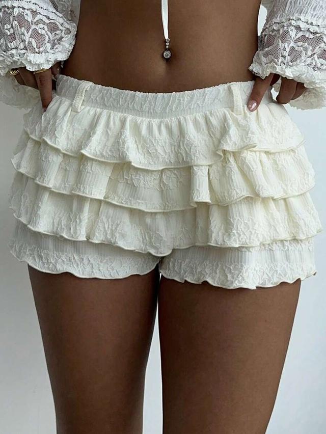 solid white ballerina style ultra-low waist ruffle skort