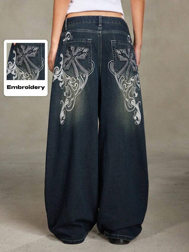 distressed wide leg jeans with cross vine embroidery
