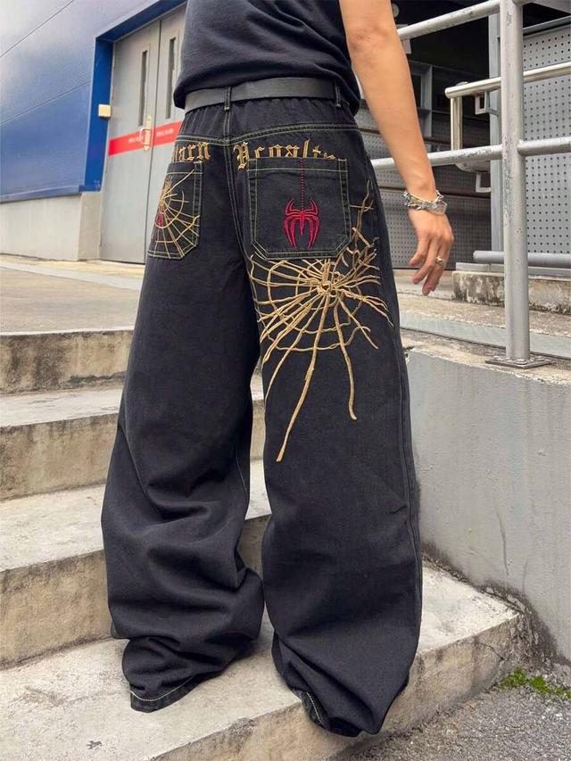 black embroidered loose fit jeans with spider web embroidery