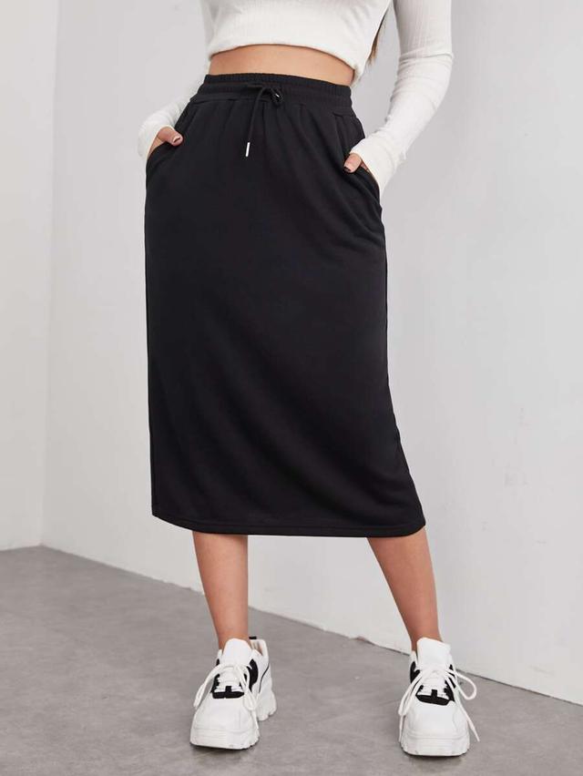 black drawstring waist slant pocket midi skirt
