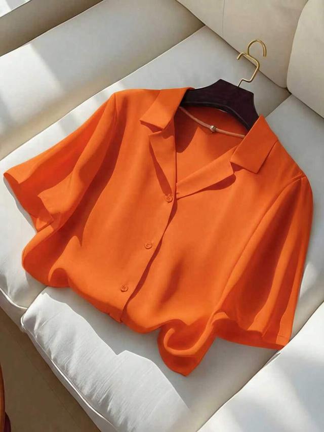 orange casual collared short sleeve button-up shirt