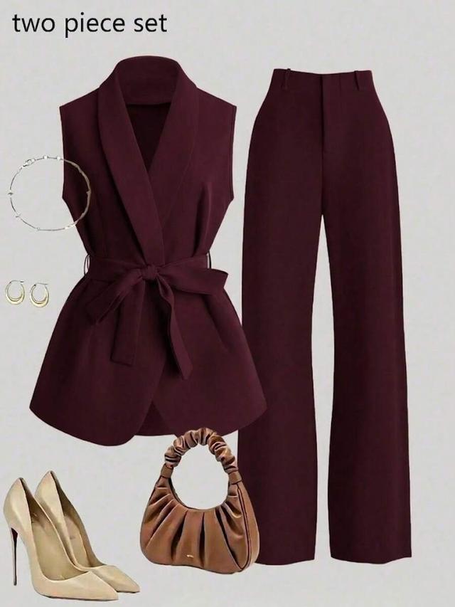 burgundy sleeveless belted vest jacket