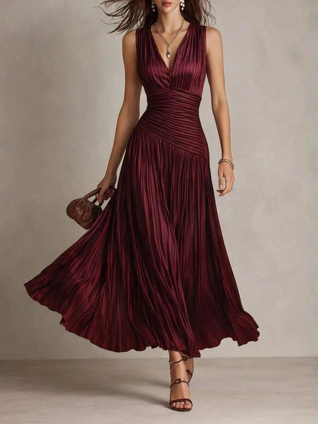 elegant sleeveless pleated burgundy gown