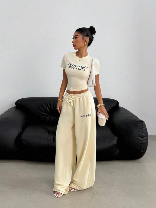 cream slogan print drawstring wide leg lounge pants