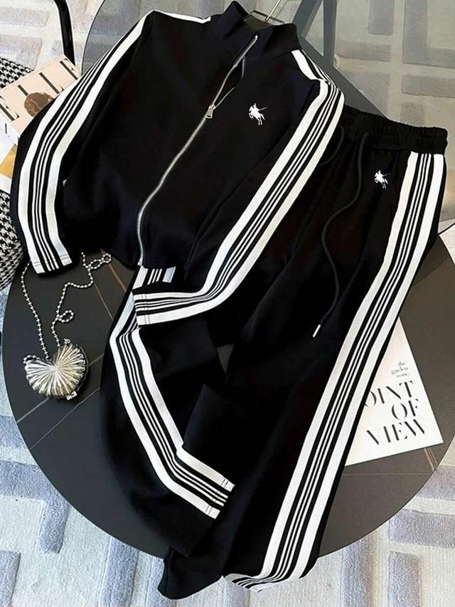 black stand collar zip-up jacket and matching track pants