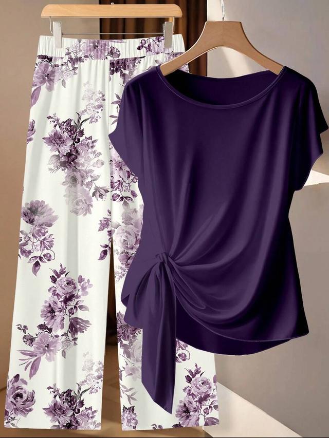 dark purple tie bow shirt and floral straight pants