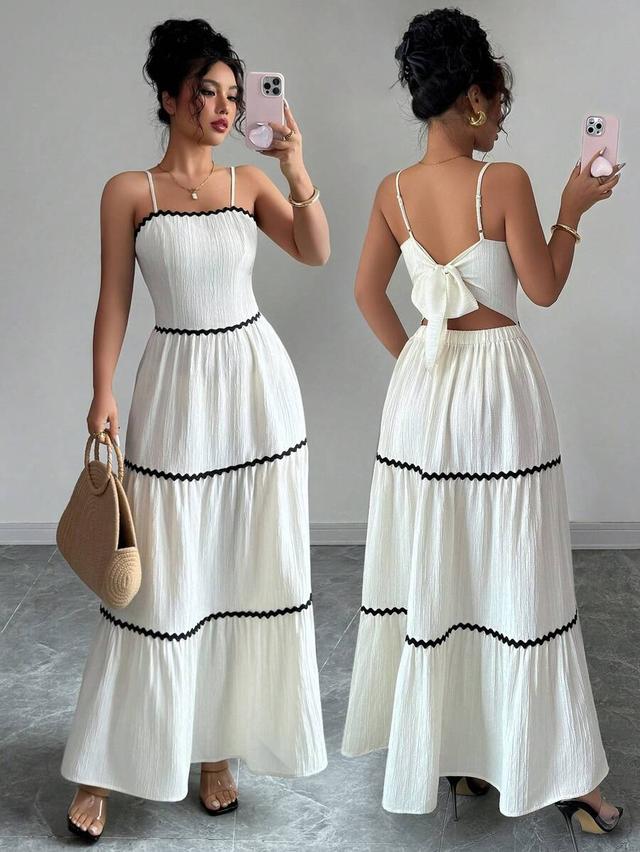 white textured strap dress with black rickrack trim