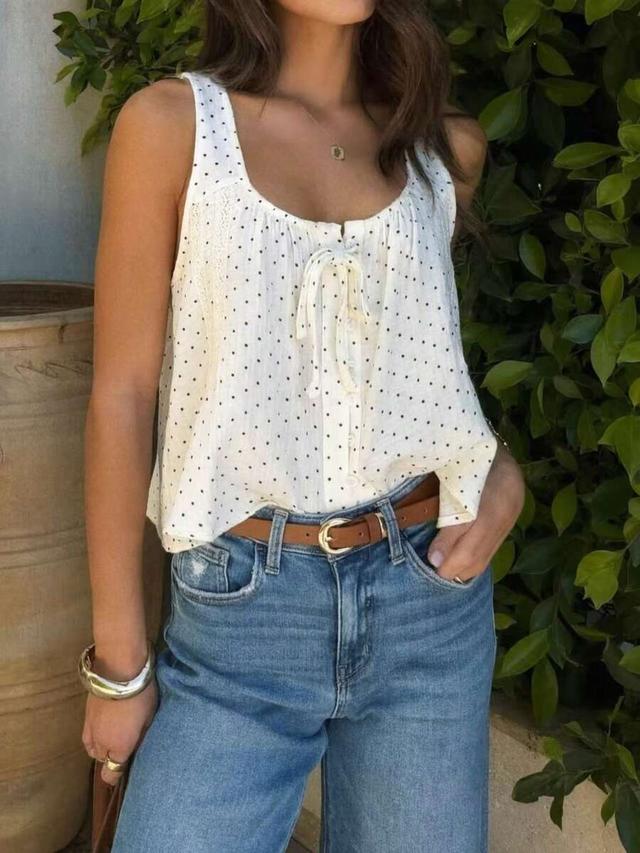 sleeveless white woven tank with polka dots and lace